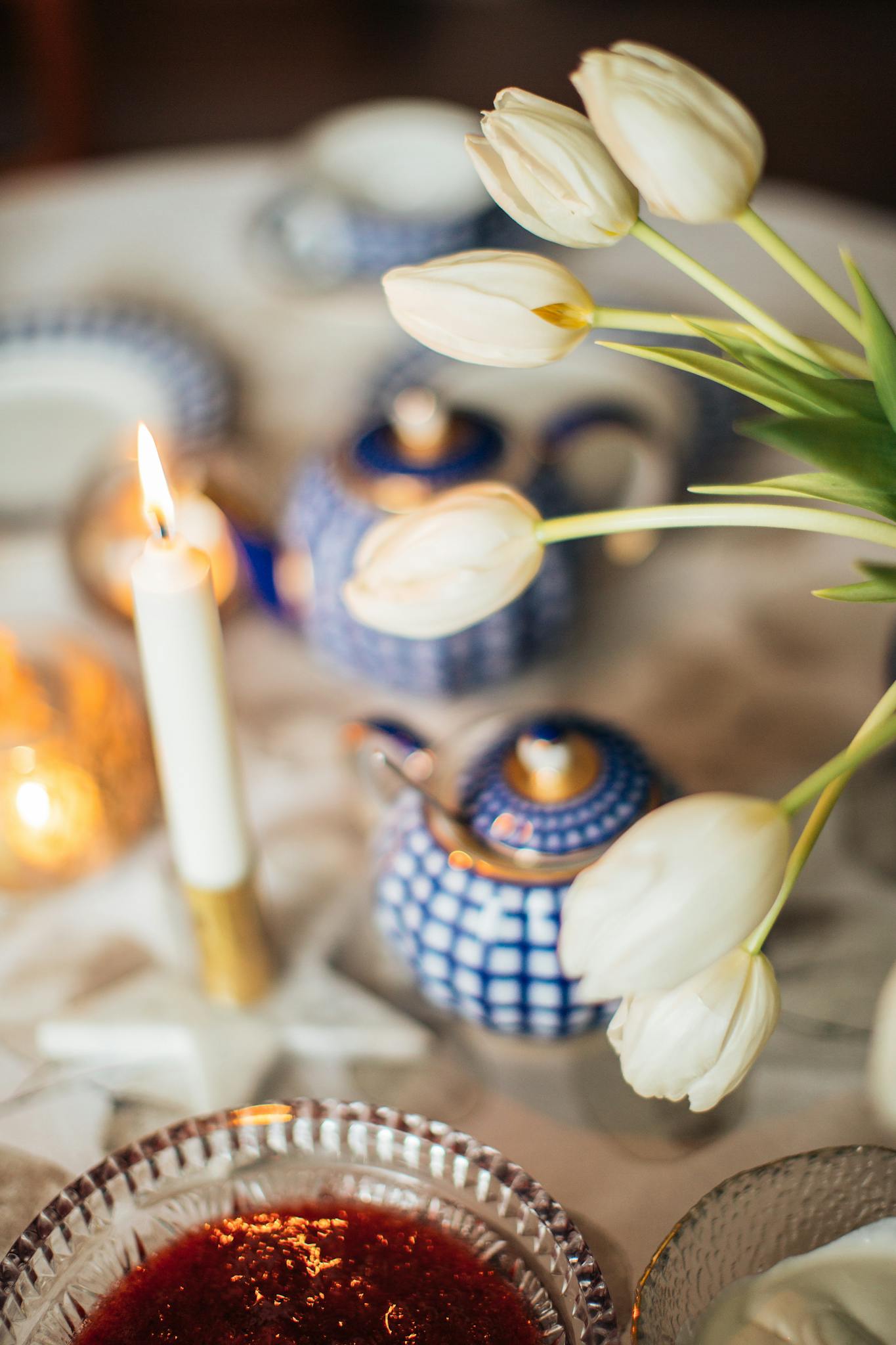 Bouquet of white flowers on table set for tea